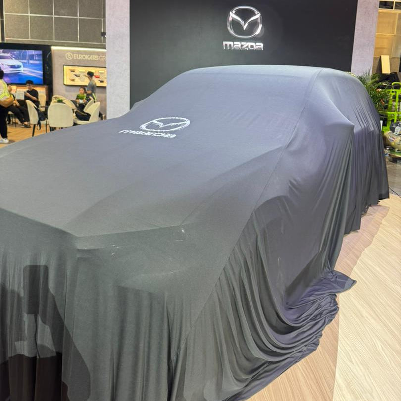 Mazda unveiling cover