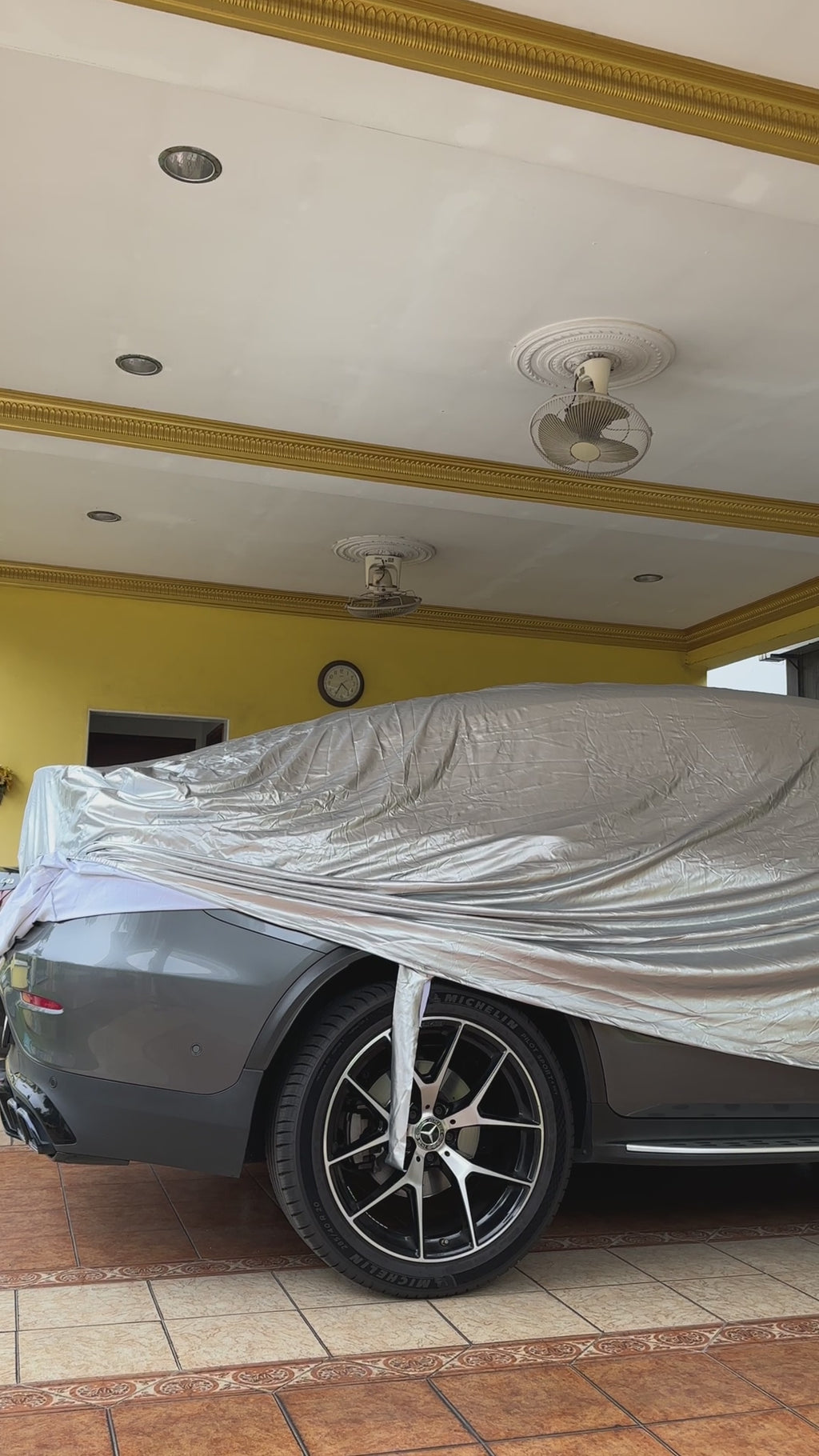 putting on ultimate outdoor car cover