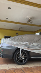 putting on ultimate outdoor car cover